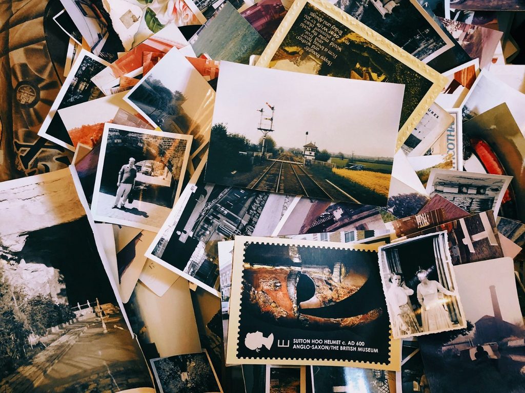 piles of postcards and photos in no particular order
